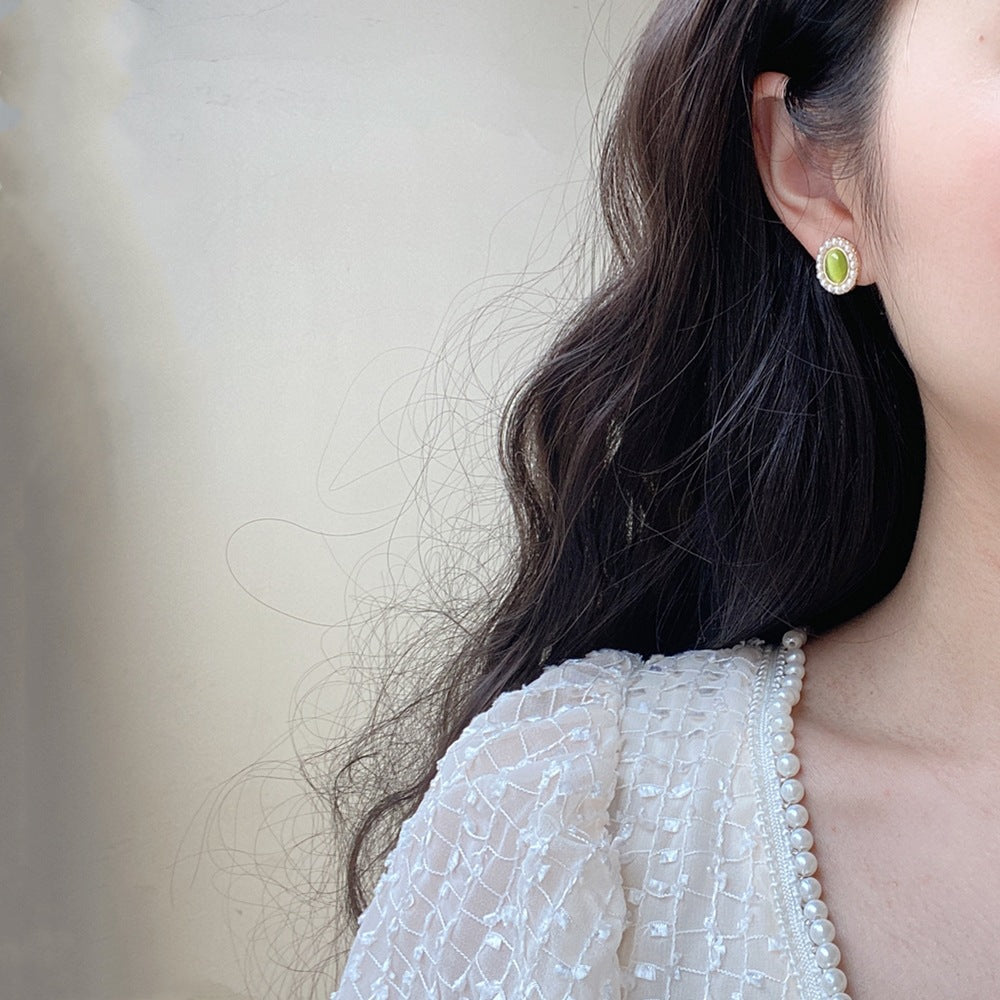 Pearl green cat's eye earrings