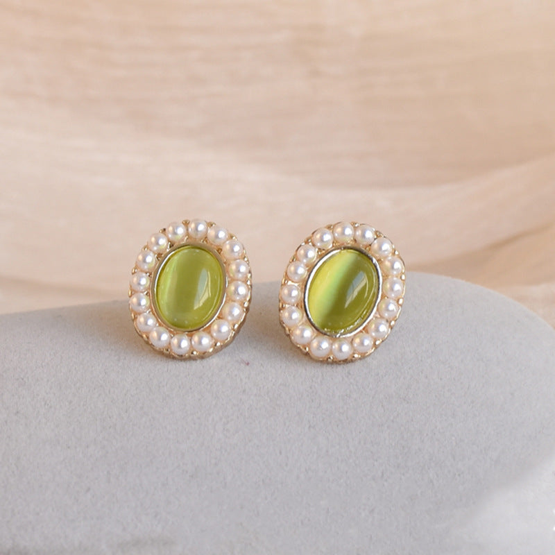 Pearl green cat's eye earrings