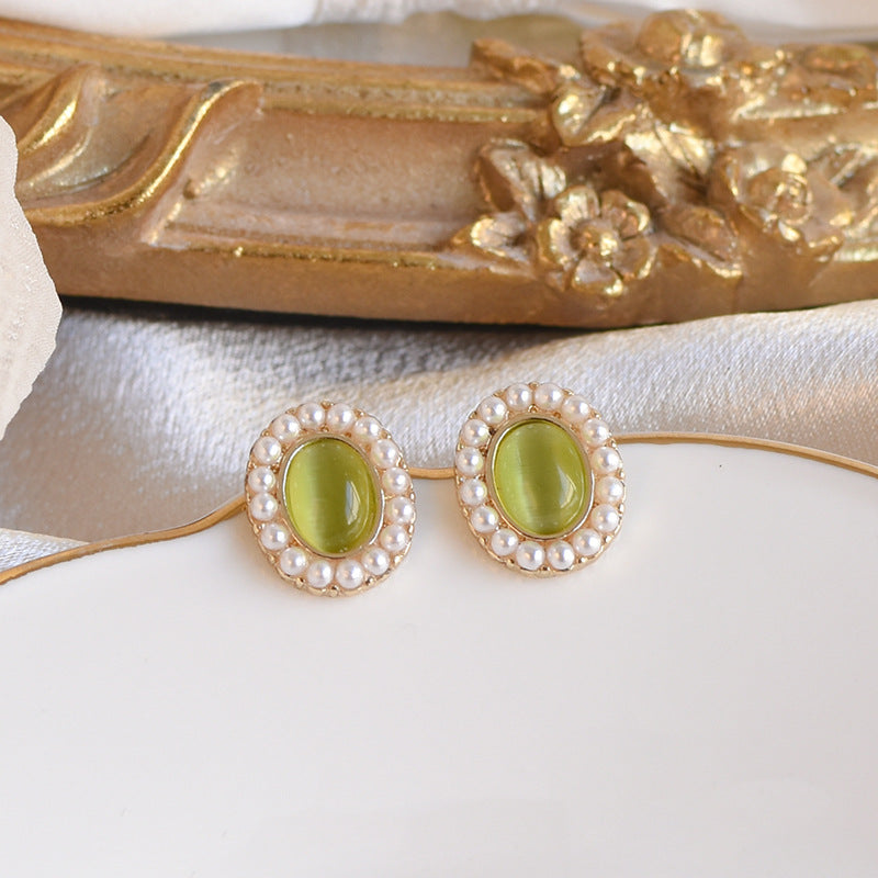 Pearl green cat's eye earrings