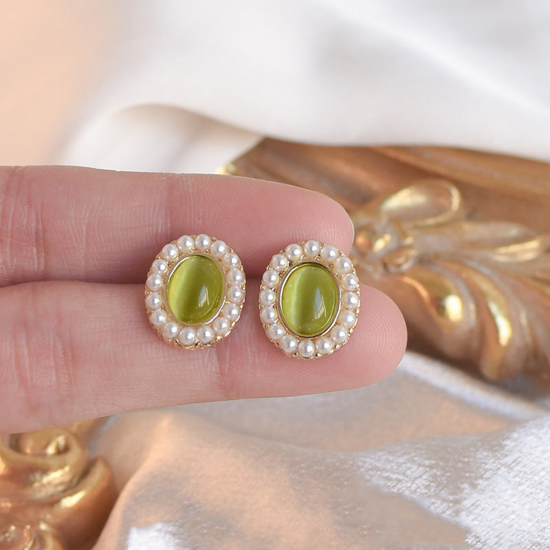 Pearl green cat's eye earrings