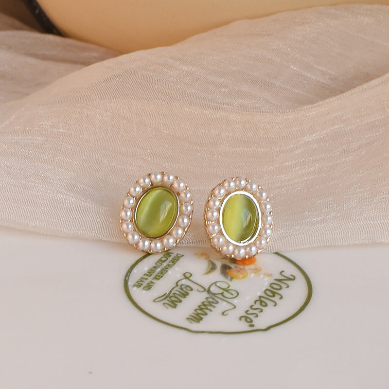 Pearl green cat's eye earrings