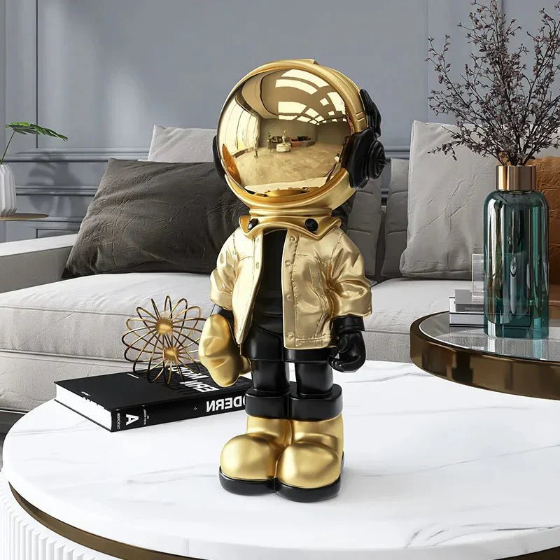 CosmoLuxe – Elegant Astronaut Statue with Gold Accents